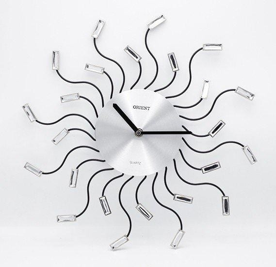 Orient spider clock metal glass,